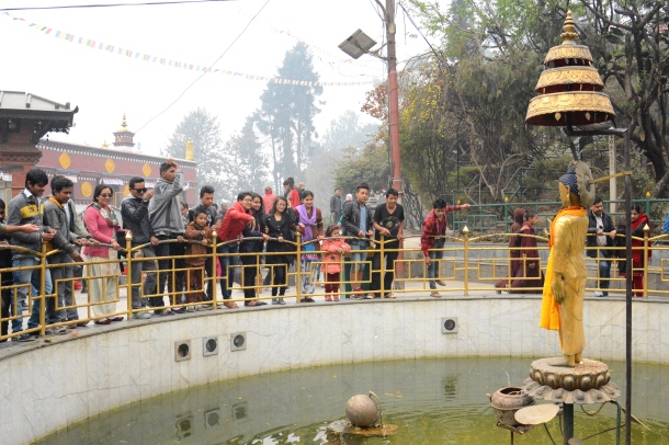 2 Swayambhu throwing coins
